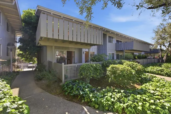 a view of a house with a garden