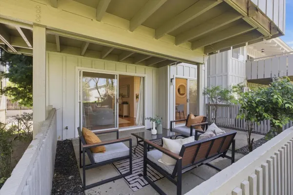 a building outdoor space with patio furniture