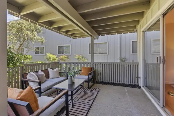 a view of porch with furniture
