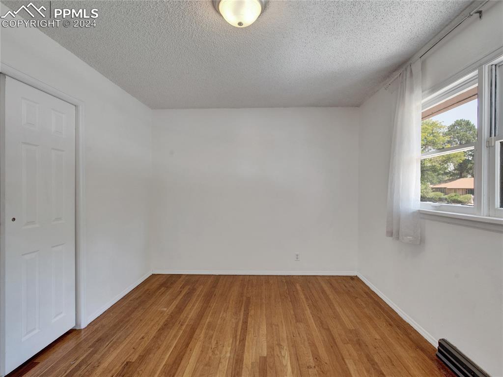 39 Duke Street Pueblo, CO 81005 - Photo 12 of 27 a view of a room with wooden floor and windows