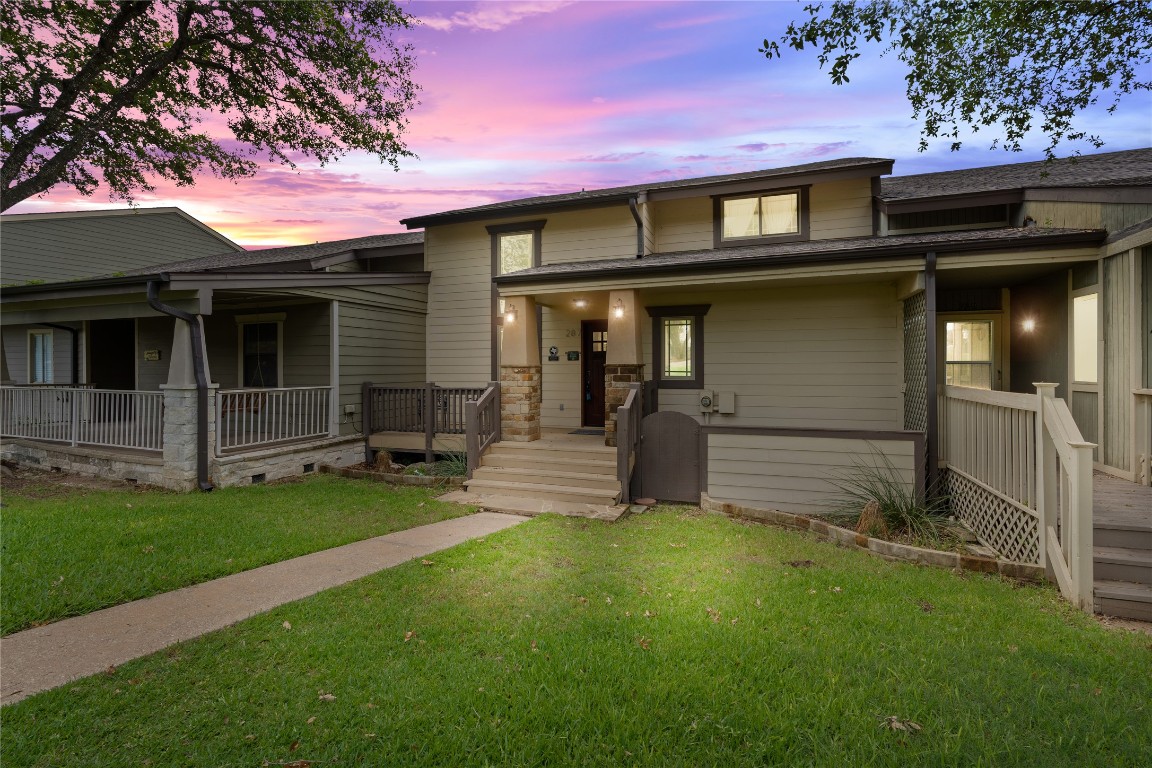 a view of a house with a back yard