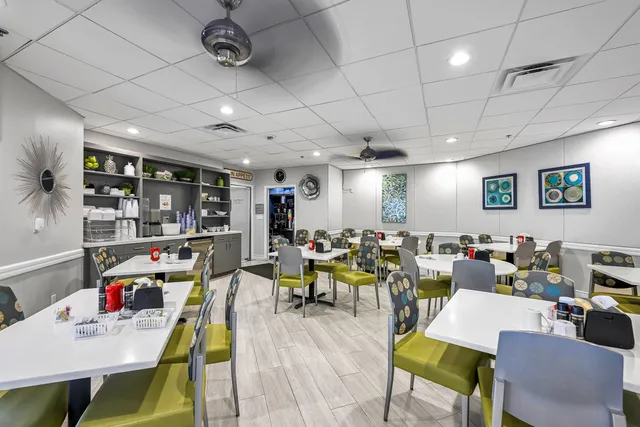 a view of a dining room with furniture