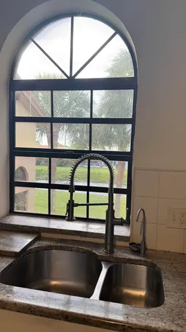 a close view of sink and window