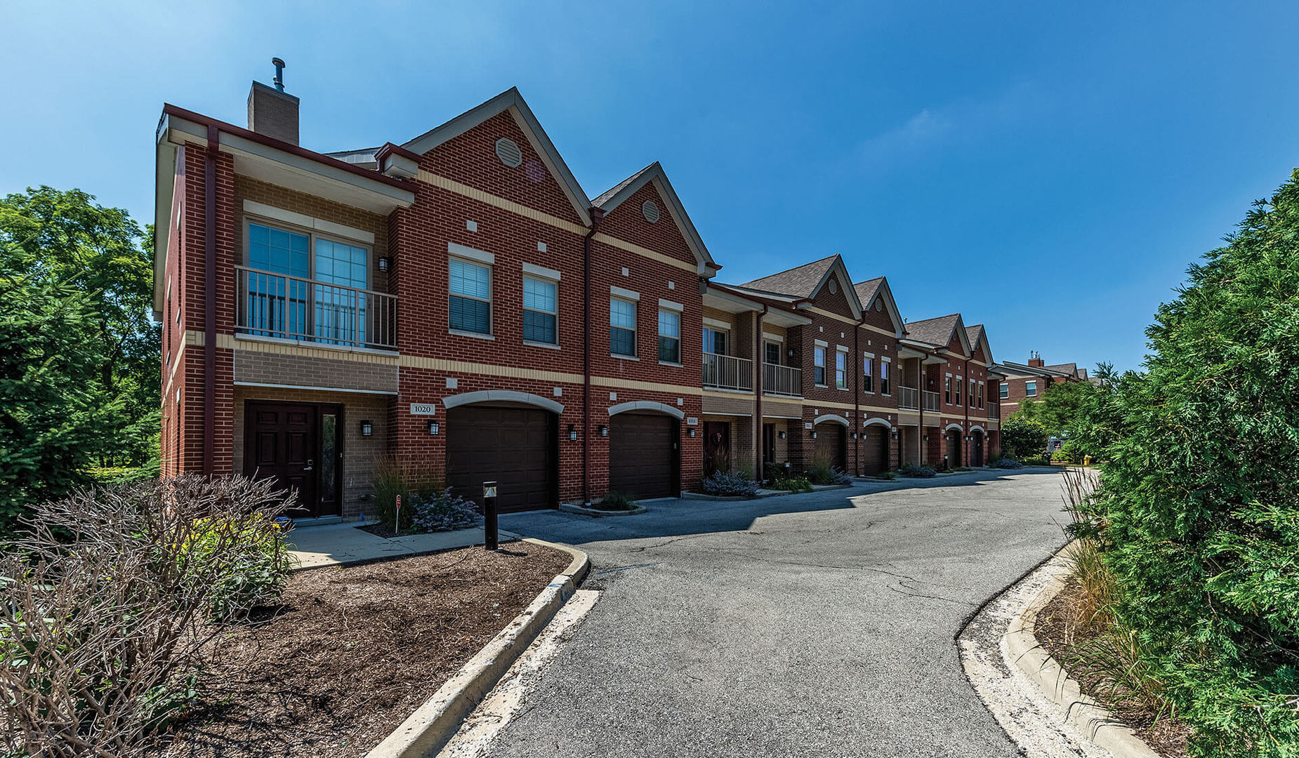 a view of a building with a yard