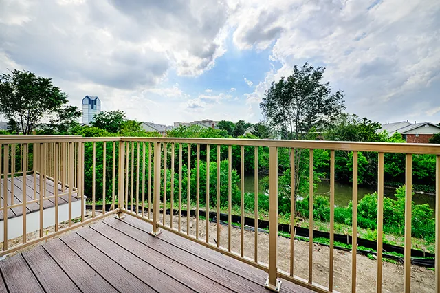a view of a wooden roof deck