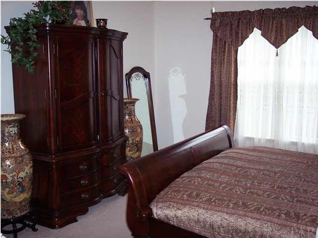 5037 Roland Road Pace, FL 32571 - Photo 18 of 24 Opposite wall in master bedroom.
