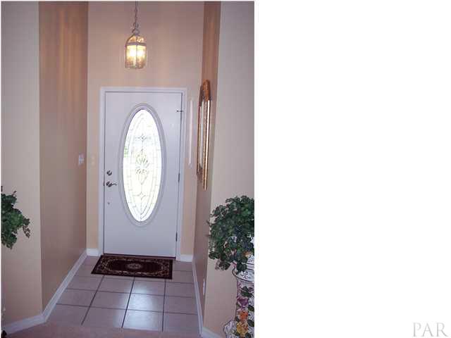 5037 Roland Road Pace, FL 32571 - Photo 3 of 24 Foyer area. Leaded glass front door.