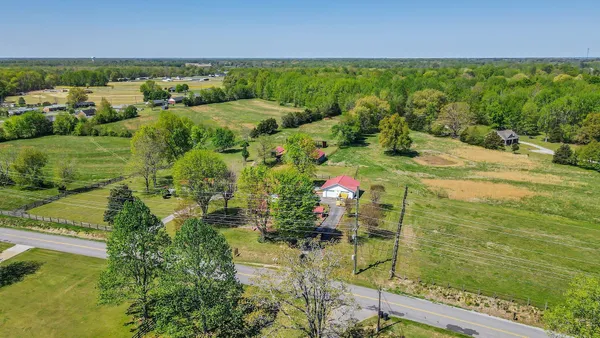 a view of a lake with a yard