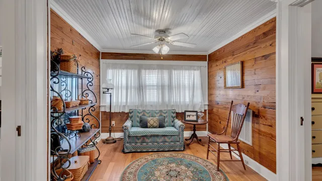 a living room with furniture and a window