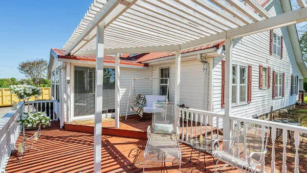 a porch with seating space