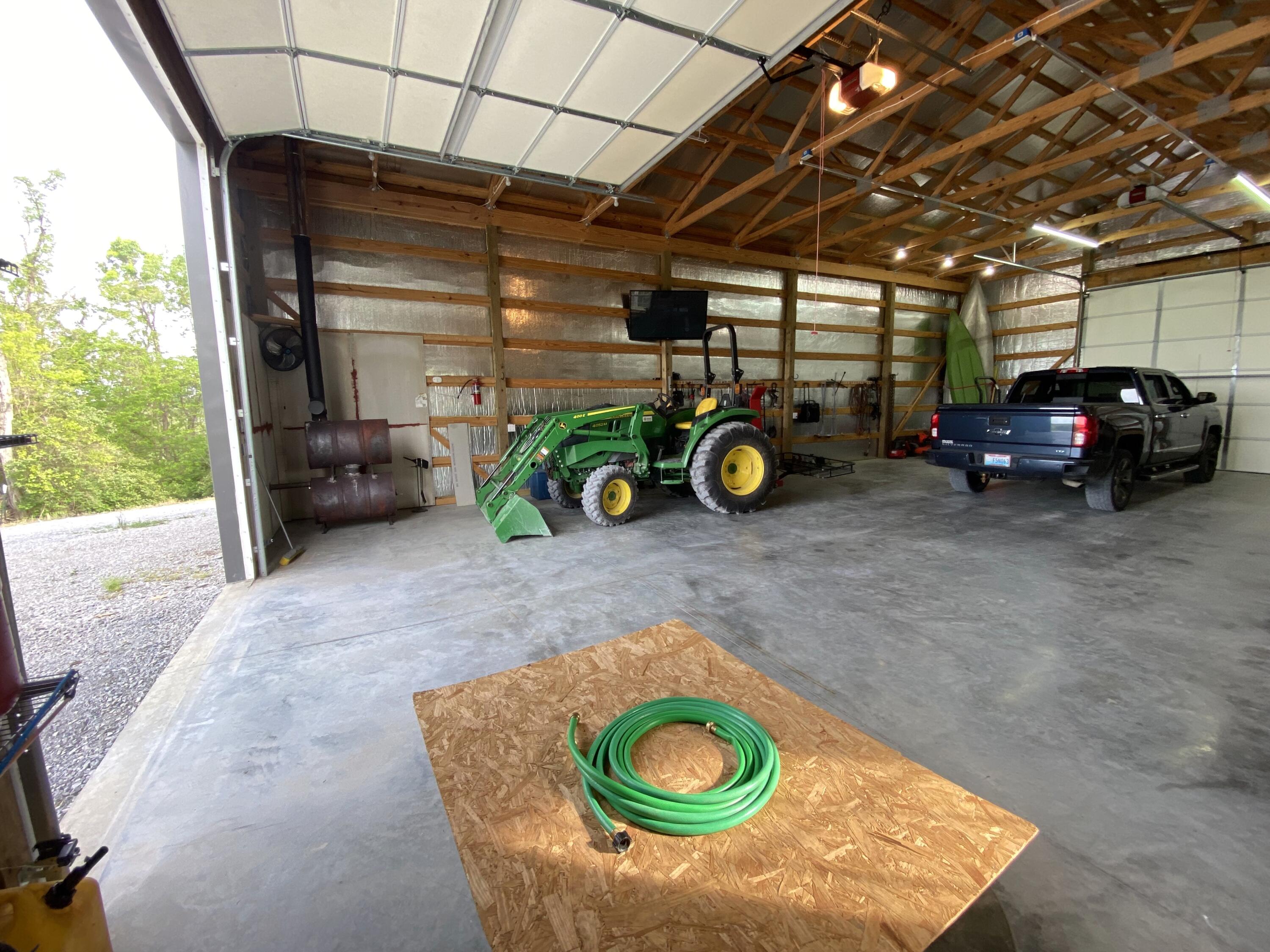 5055 Muddy Ford Road Georgetown, KY 40324 - Photo 35 of 47 Concrete floor and wood burning fireplace