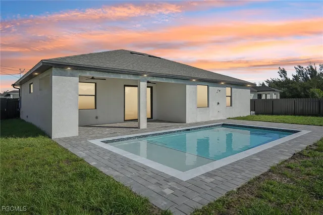 a view of outdoor space yard and front view of house