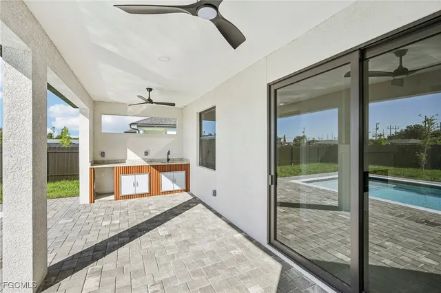a view of swimming pool with a chair