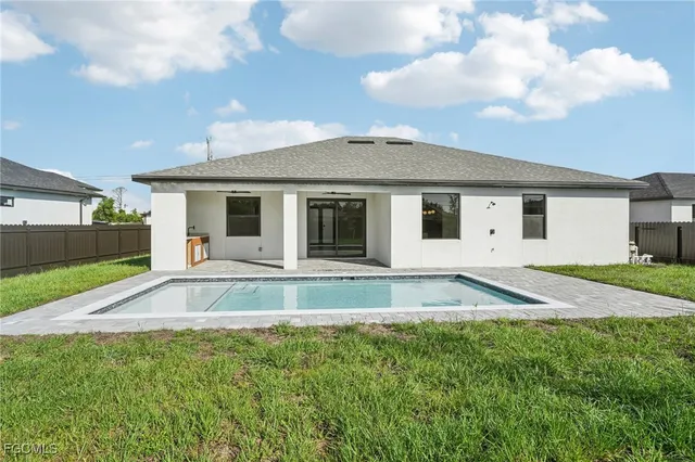 a view of a terrace with yard