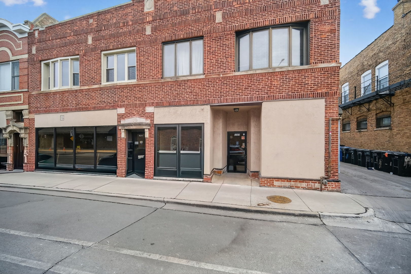 4369 North Elston Avenue Chicago, IL 60641 - Photo 1 of 43 a front view of a brick house with a large windows
