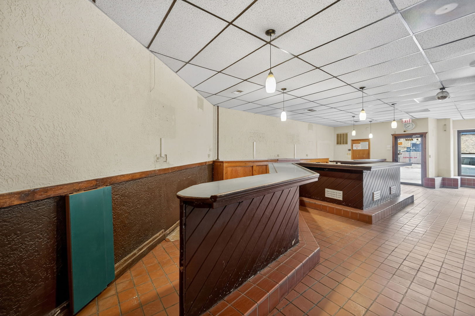 4369 North Elston Avenue Chicago, IL 60641 - Photo 20 of 43 a kitchen with stainless steel appliances wooden cabinets a sink and a stove