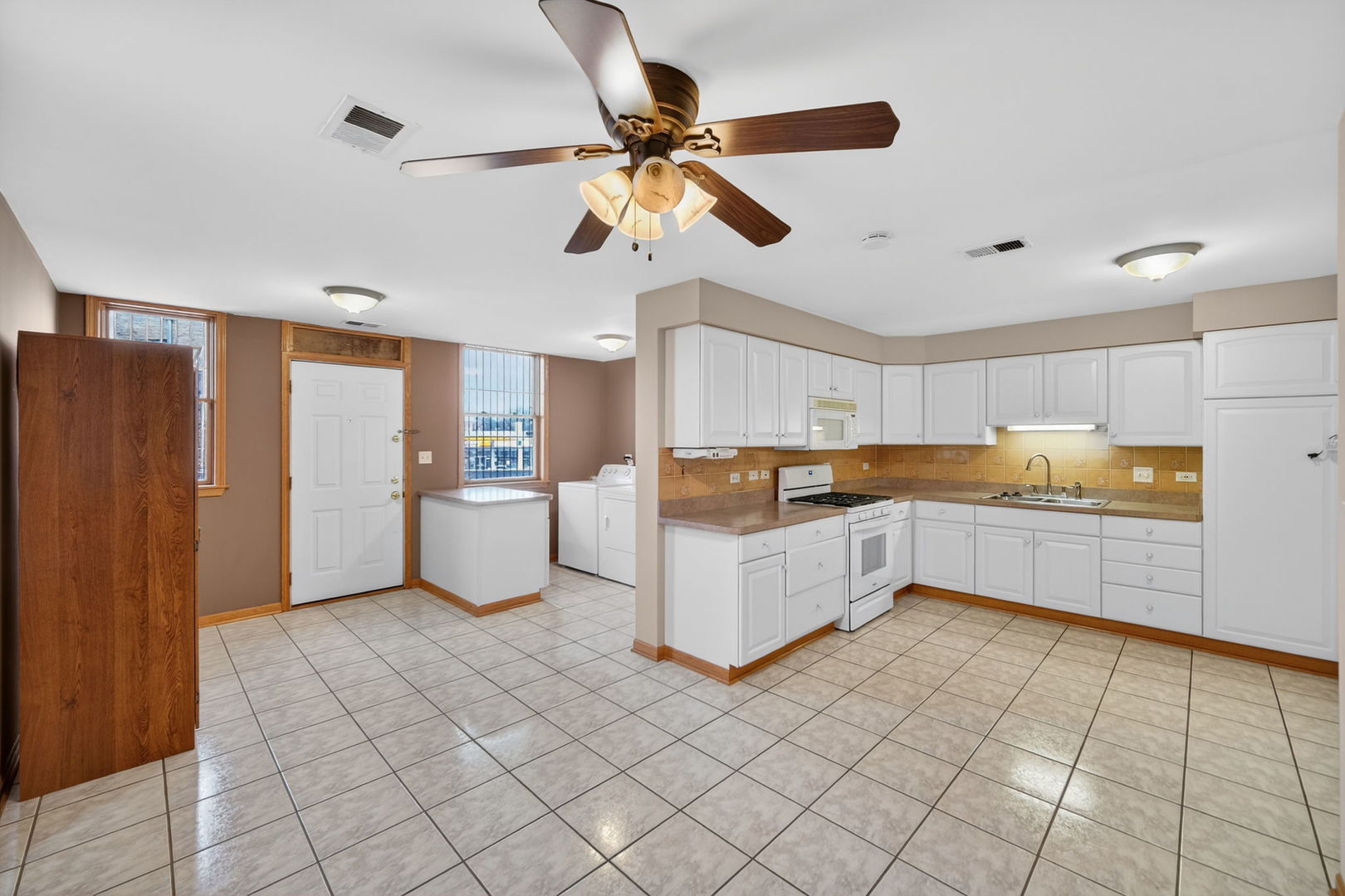 4369 North Elston Avenue Chicago, IL 60641 - Photo 29 of 43 a kitchen with a cabinets and window