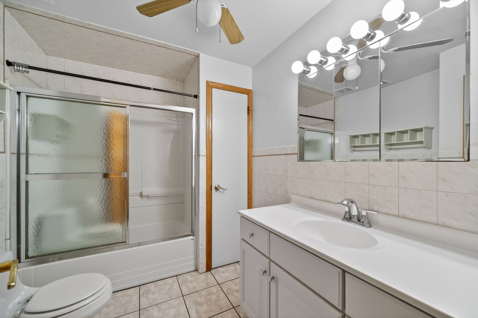 4369 North Elston Avenue Chicago, IL 60641 - Photo 37 of 43 a bathroom with a sink toilet and shower