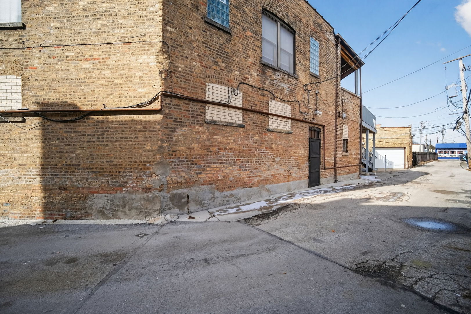 4369 North Elston Avenue Chicago, IL 60641 - Photo 40 of 43 a view of a brick building with an outdoor space