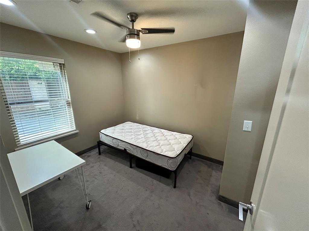 301 East Brockett Street Sherman, TX 75090 - Photo 6 of 14 a living room with furniture and a window