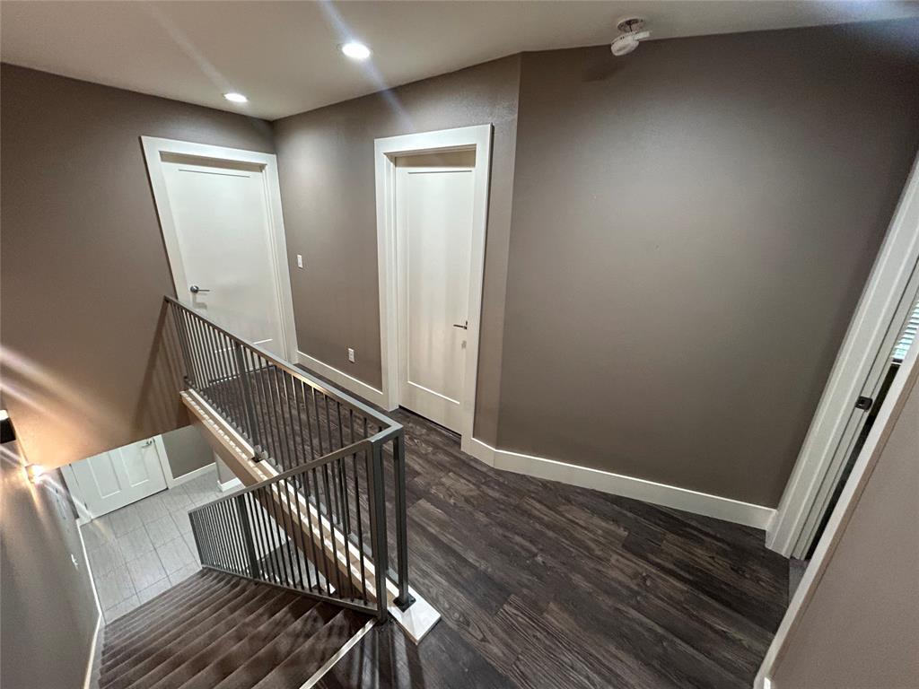 301 East Brockett Street Sherman, TX 75090 - Photo 8 of 14 a view of entryway with wooden floor