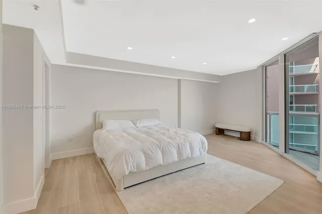 a bathroom with a shower and a toilet