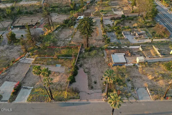 an aerial view of residential house with outdoor space