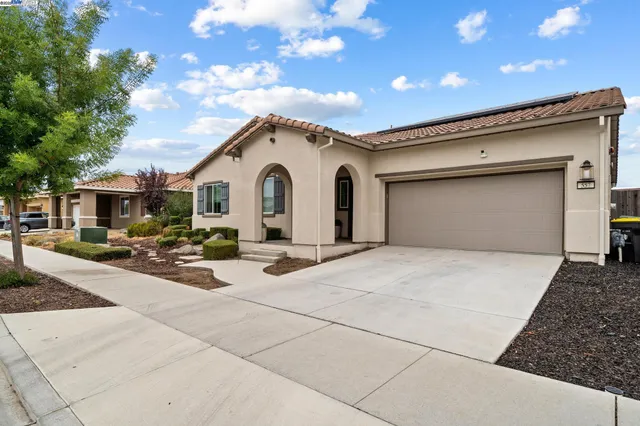 a view of a house with a patio
