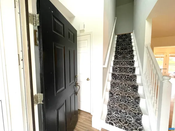 a view of a hallway with windows