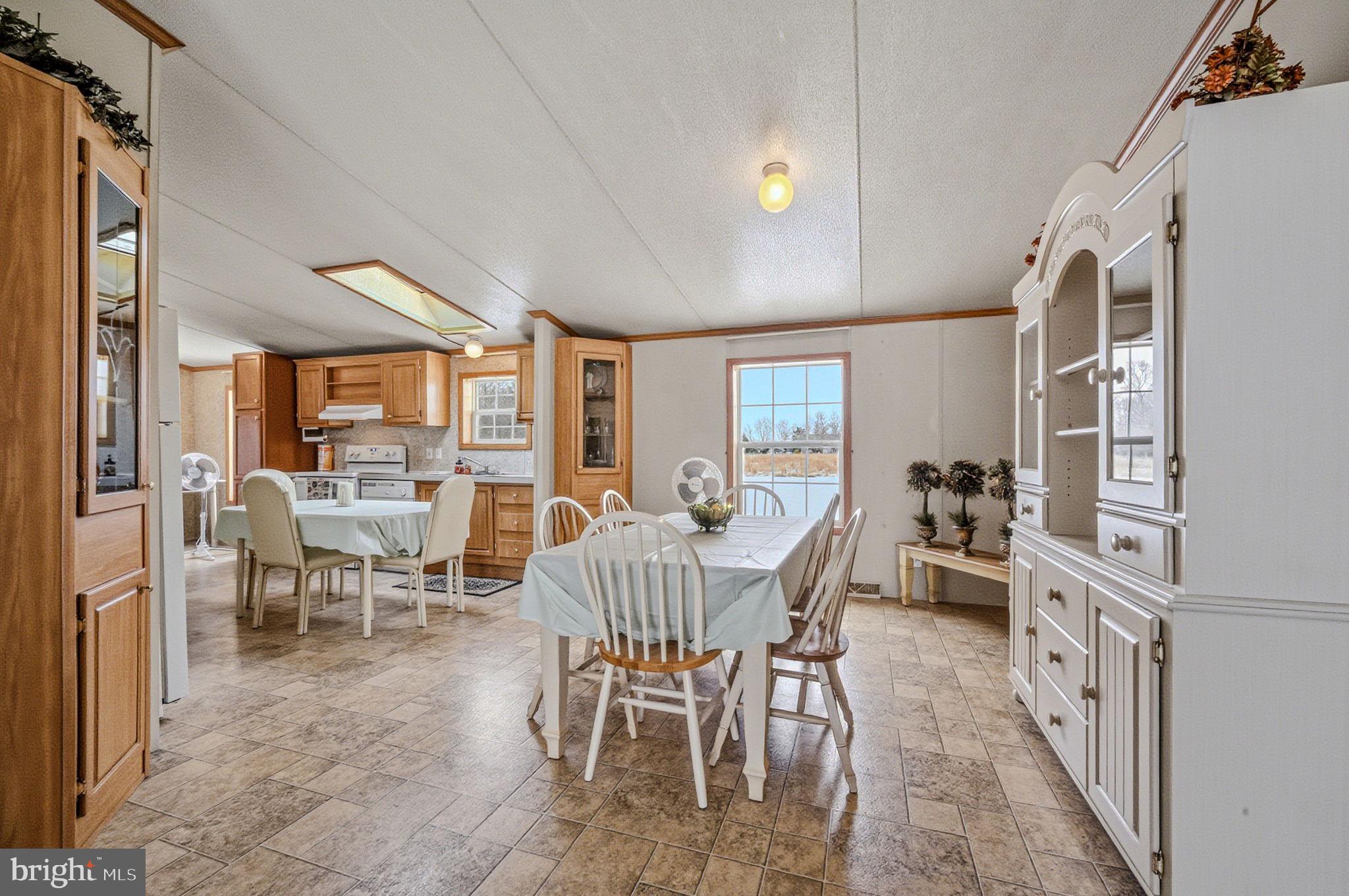 2237 Marshyhope Road Felton, DE 19943 - Photo 17 of 38 a view of a dining room with furniture