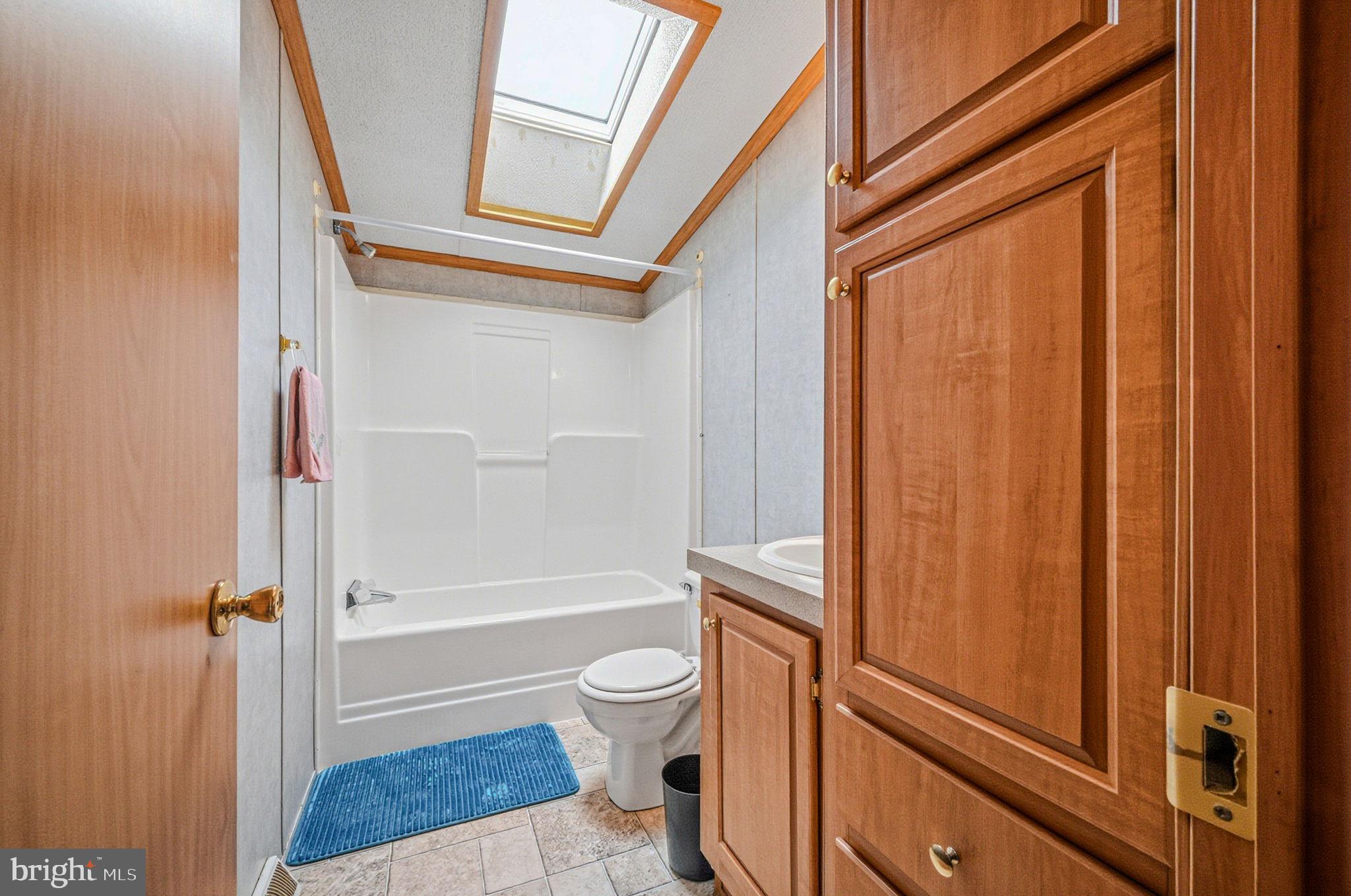 2237 Marshyhope Road Felton, DE 19943 - Photo 28 of 38 a bathroom with a toilet and a shower