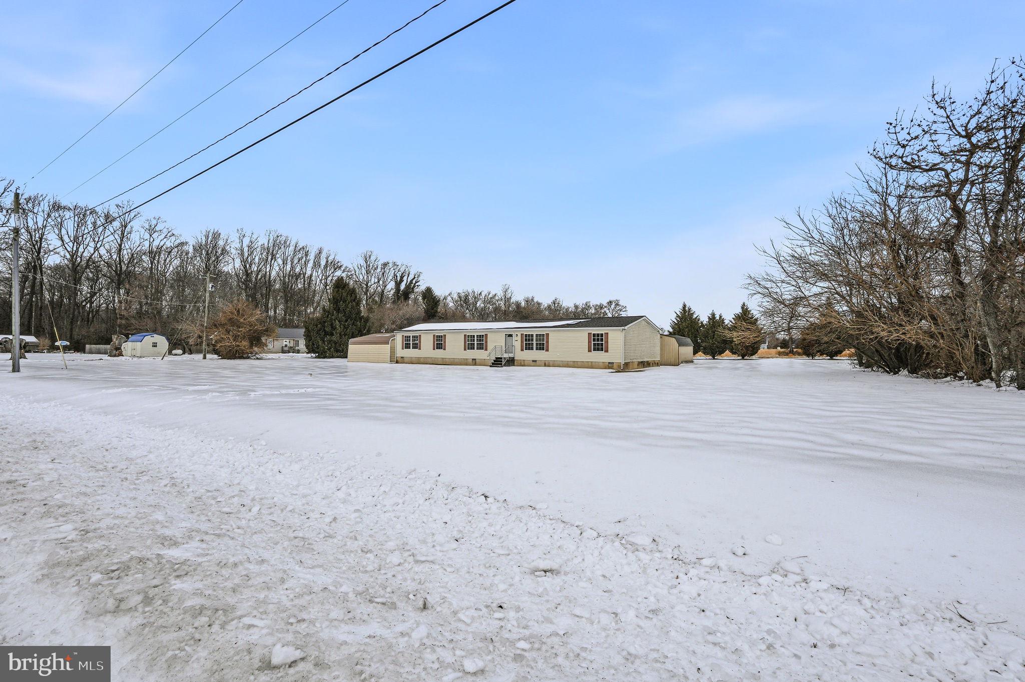 2237 Marshyhope Road Felton, DE 19943 - Photo 5 of 38 a view of flat screen tv