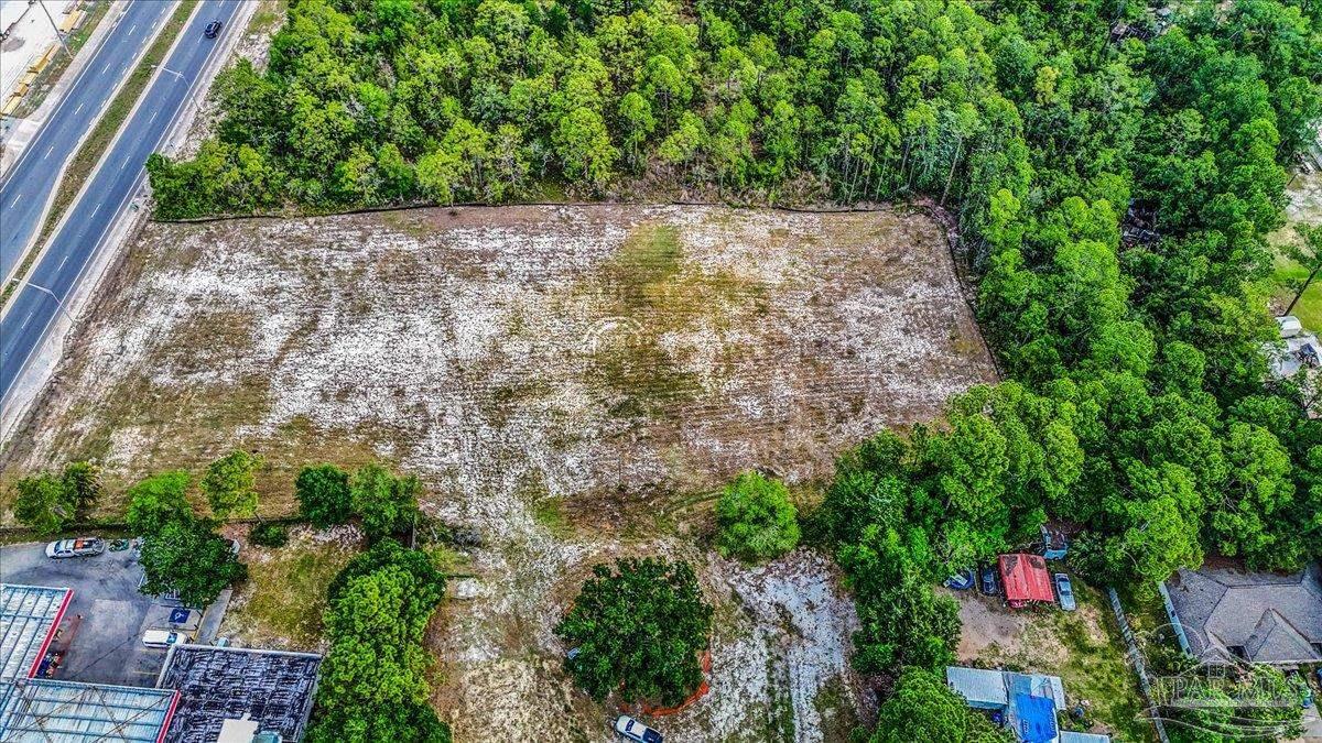 2032 Highway 87 Navarre, FL 32566 - Photo 6 of 11 an aerial view of residential house with outdoor space