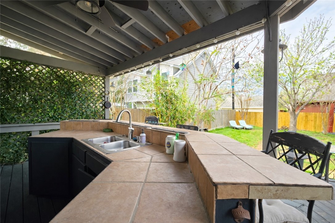 332 Southern Street Corpus Christi, TX 78404 - Photo 15 of 20 a open dining space with chairs and table in the patio