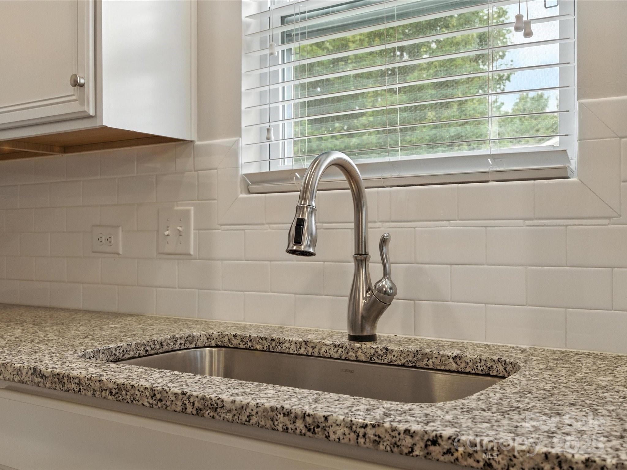 1628 Spring Blossom Trail Fort Mill, SC 29708 - Photo 12 of 42 a bathroom with a bathtub and window