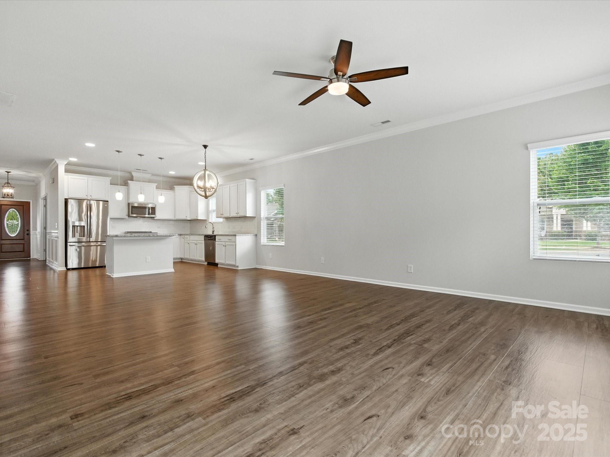 1628 Spring Blossom Trail Fort Mill, SC 29708 - Photo 21 of 42 a view of a kitchen with a sink and a window