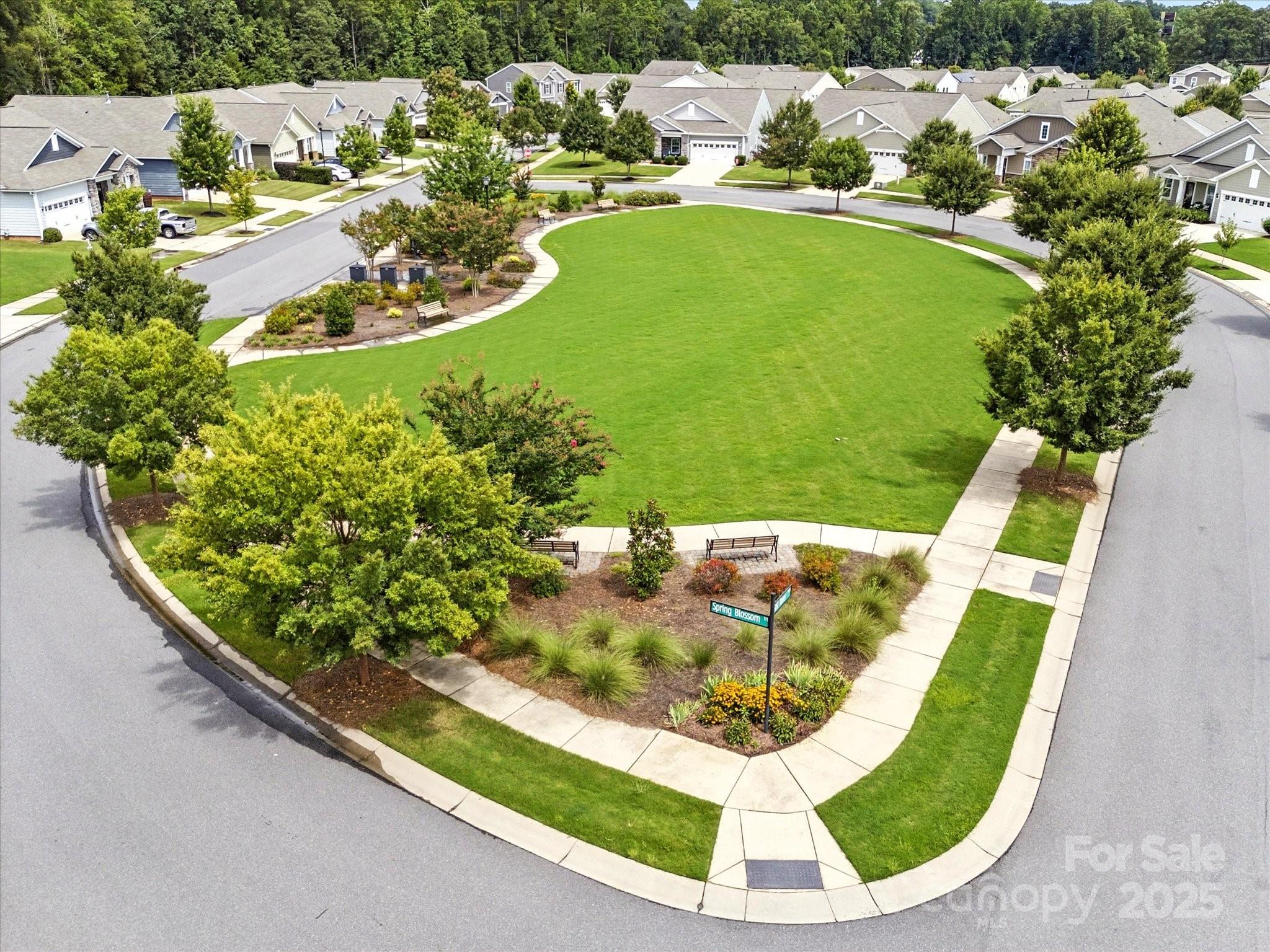 1628 Spring Blossom Trail Fort Mill, SC 29708 - Photo 41 of 42 a view of a swimming pool with a yard
