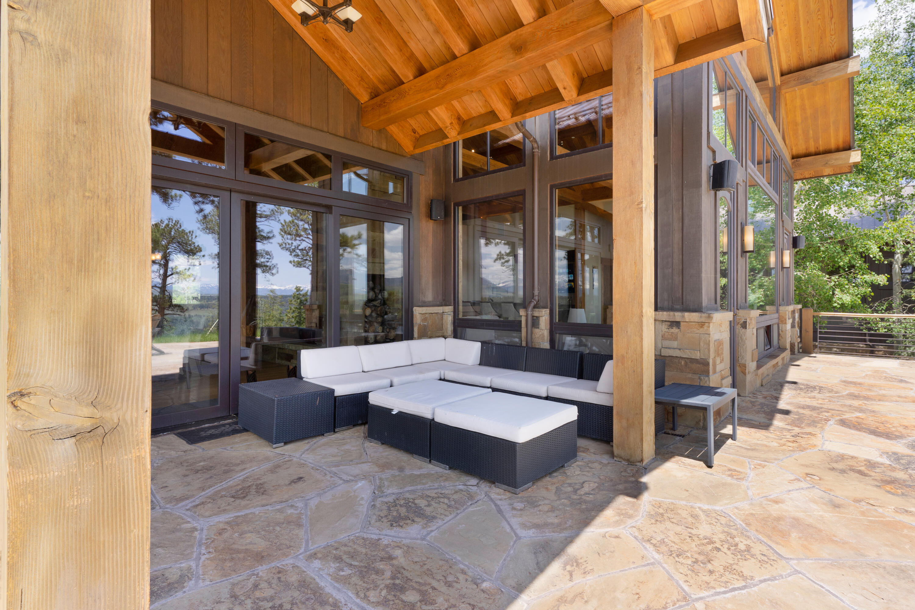 280 Sage Grouse Ridgway, CO 81432 - Photo 27 of 28 a outdoor space with patio the couches and a dining table with the view of the house