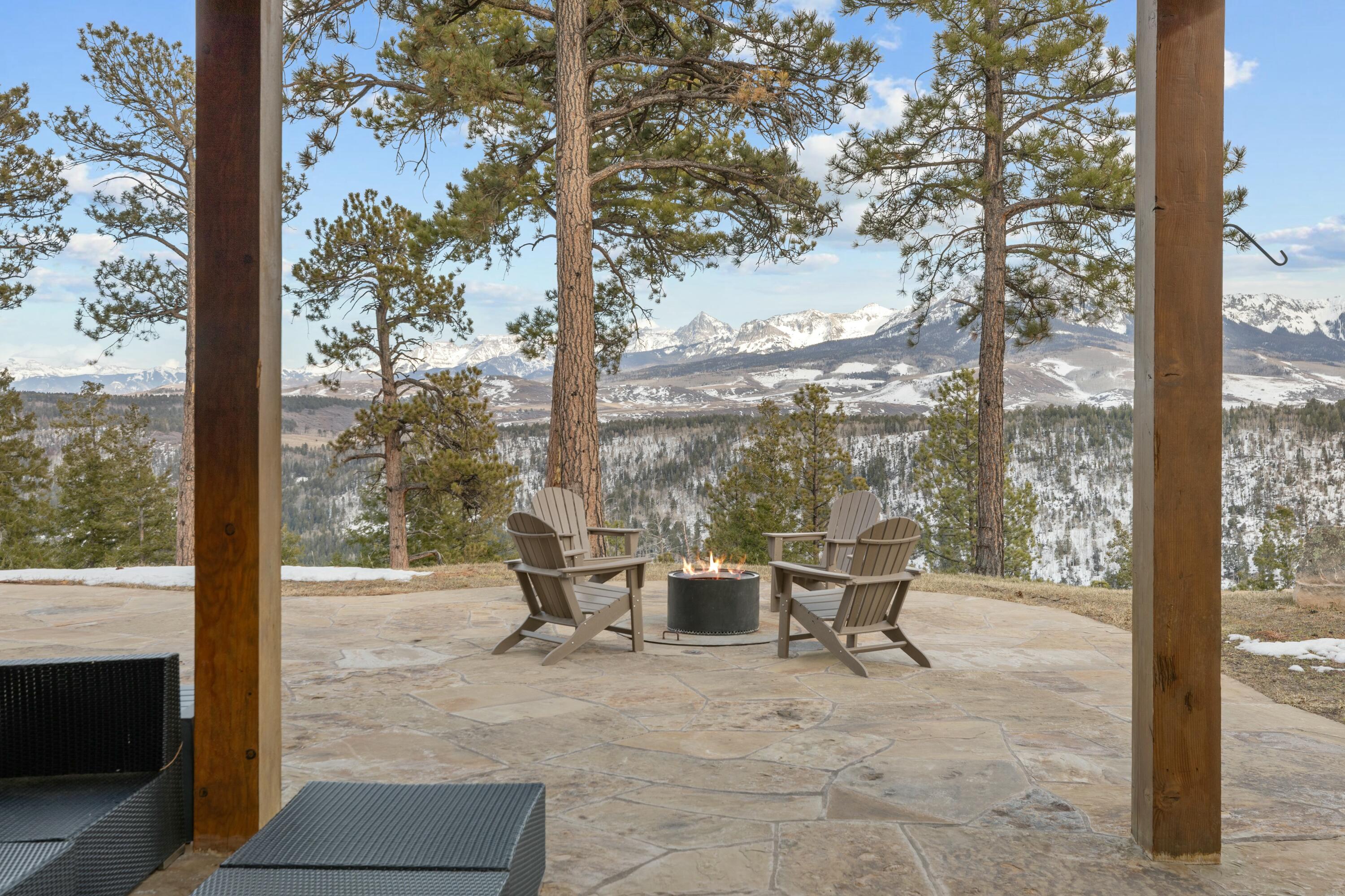 280 Sage Grouse Ridgway, CO 81432 - Photo 8 of 28 a view of a porch with chairs and table in the patio