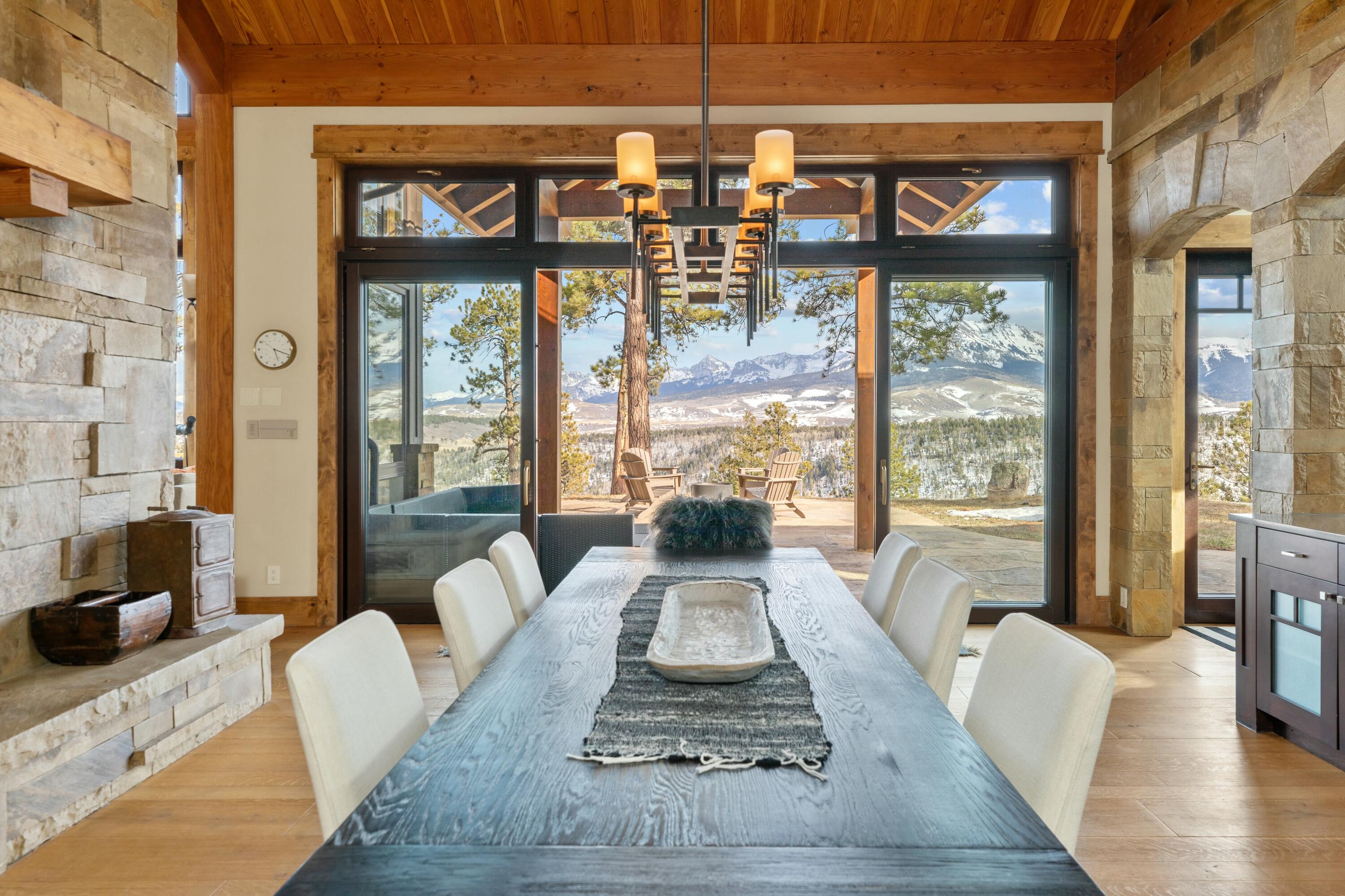 280 Sage Grouse Ridgway, CO 81432 - Photo 10 of 28 a living room with furniture and floor to ceiling windows