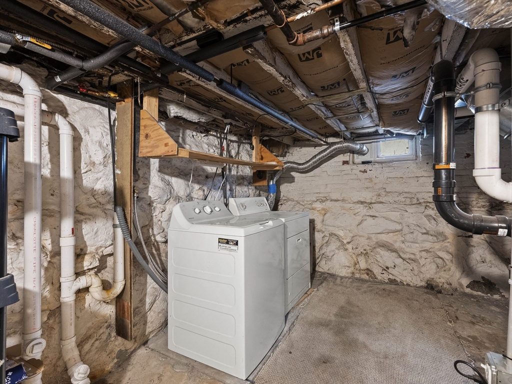 27 Kilby Street, Unit 27 Woburn, MA 01801 - Photo 35 of 35 a utility room with dryer and washer