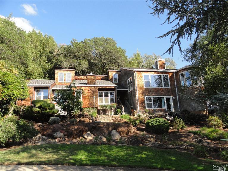 3655 Rolling Oaks Road Santa Rosa, CA 95404 - Photo 1 of 1 a view of a house with a yard and potted plants