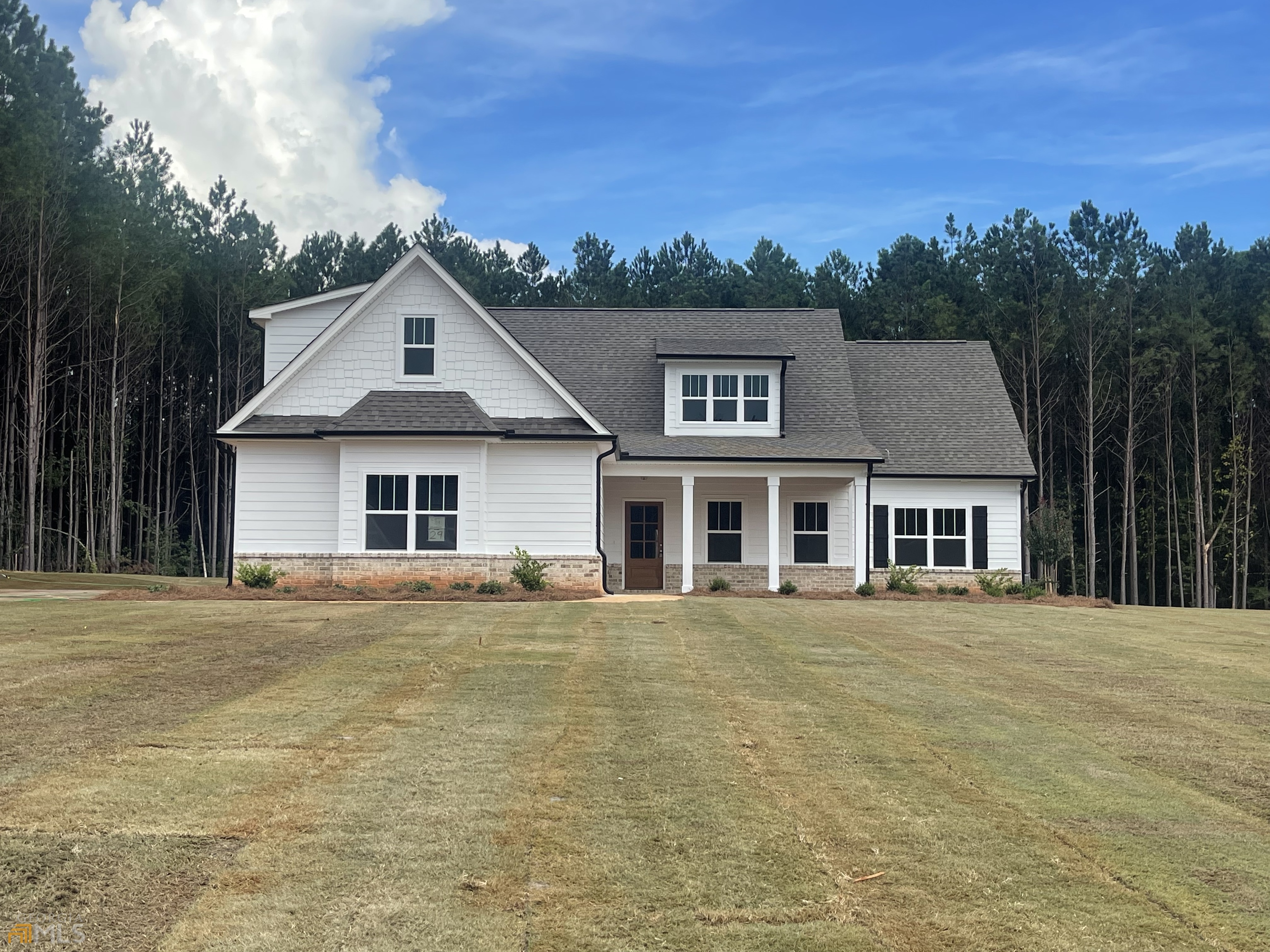 108 Maple Lane Williamson, GA 30292 - Photo 1 of 1 a front view of a house with a yard