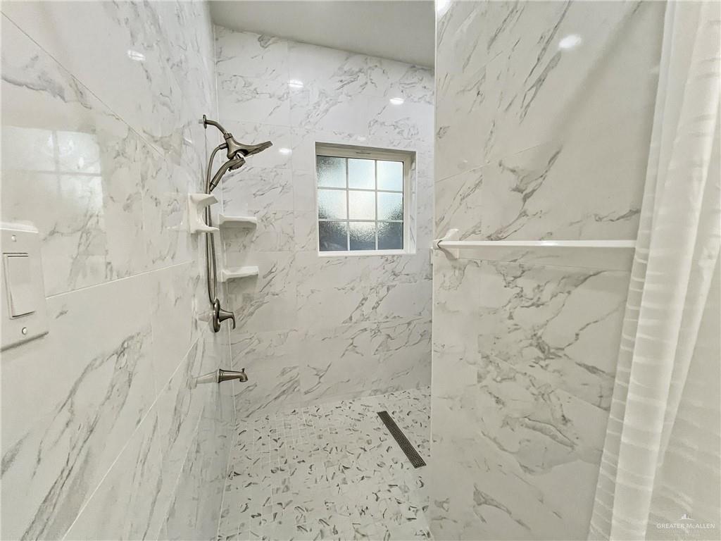 7723 Villa Rama S Street Mission, TX 78572 - Photo 13 of 15 a bathroom with a shower