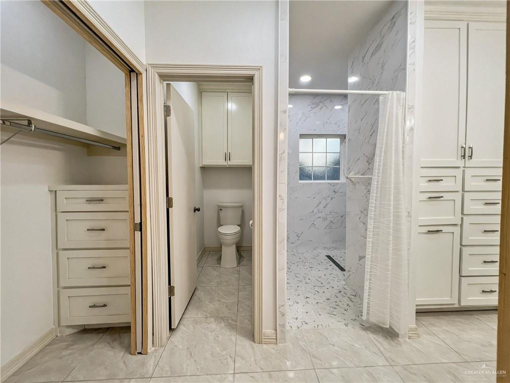 7723 Villa Rama S Street Mission, TX 78572 - Photo 10 of 15 a bathroom with a shower and a sink