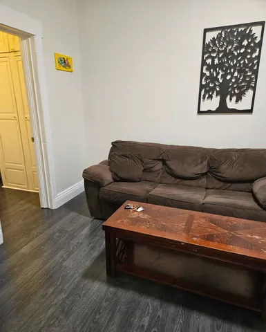 a living room with a couch and a couch