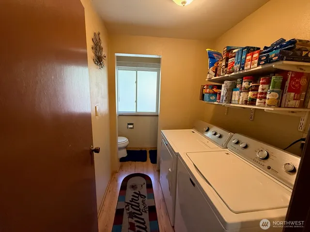 a utility room with dryer and washer