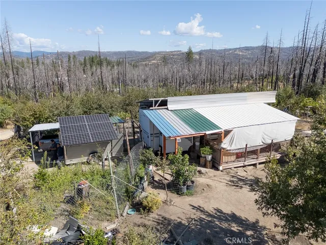 a view of a chairs and tables in patio