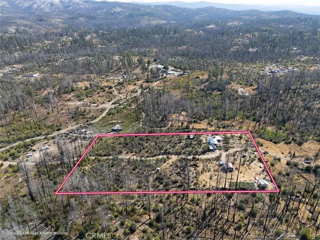 an aerial view of beach and patio