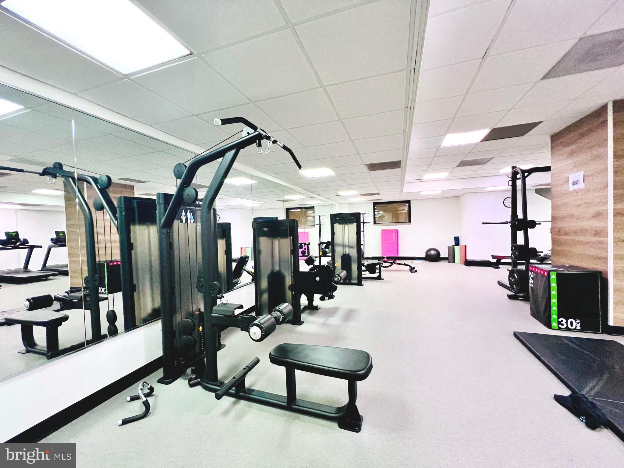 2111 Wisconsin Avenue Northwest, Unit 110 Washington, DC 20007 - Photo 21 of 32 a view of a room with gym equipment